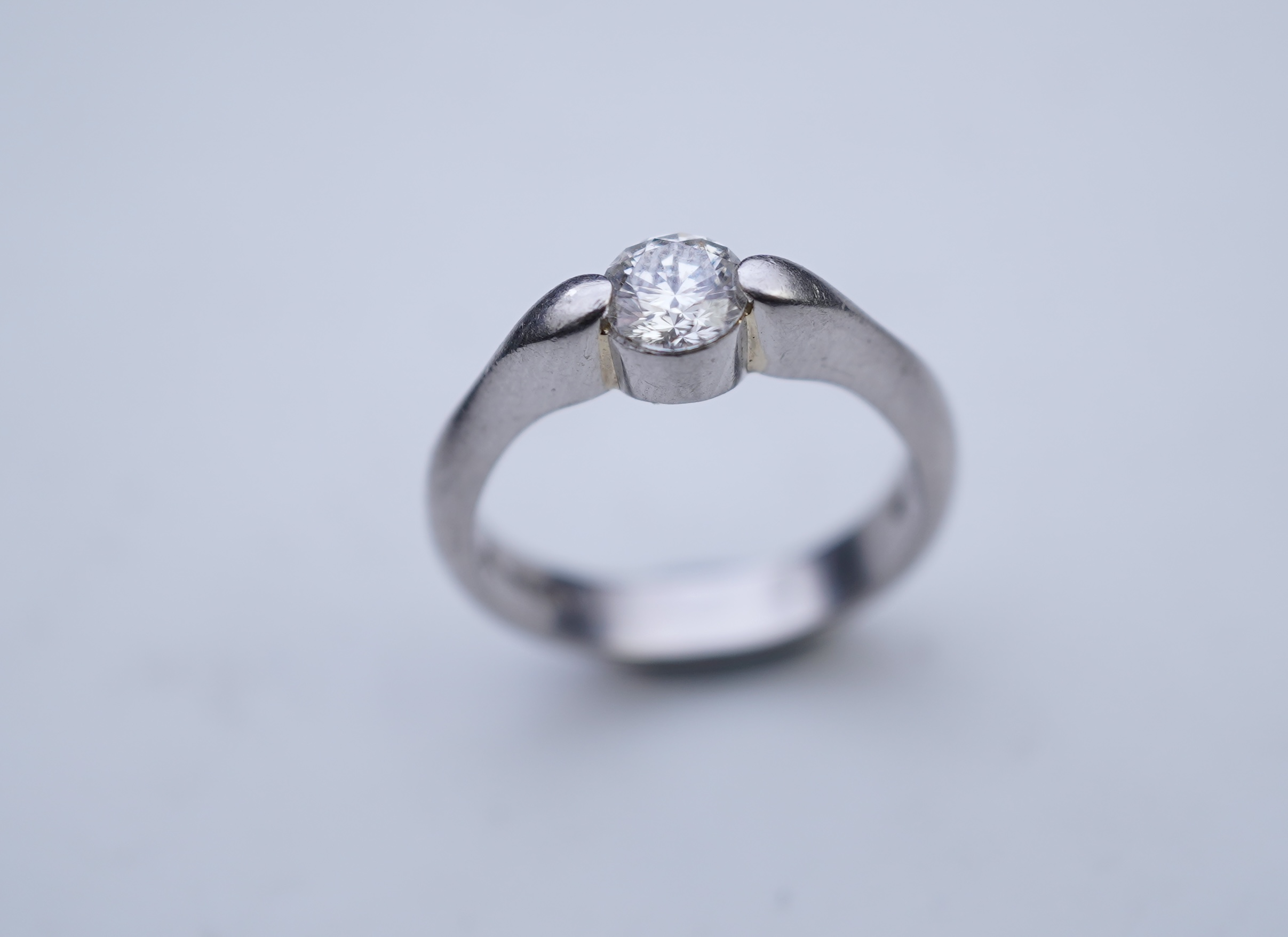 A diamond solitaire ring